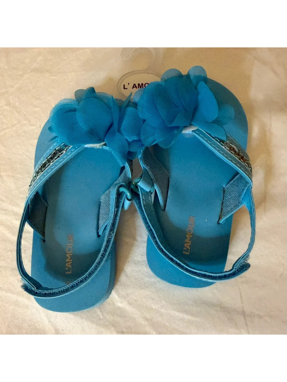 L’amour blue flower flip flops